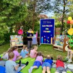 AKCJA CZYTELNICZA CZYTANIE NA TRAWIE W GMINNEJ BIBLIOTECE PUBICZNEJ W BUDZOWIE